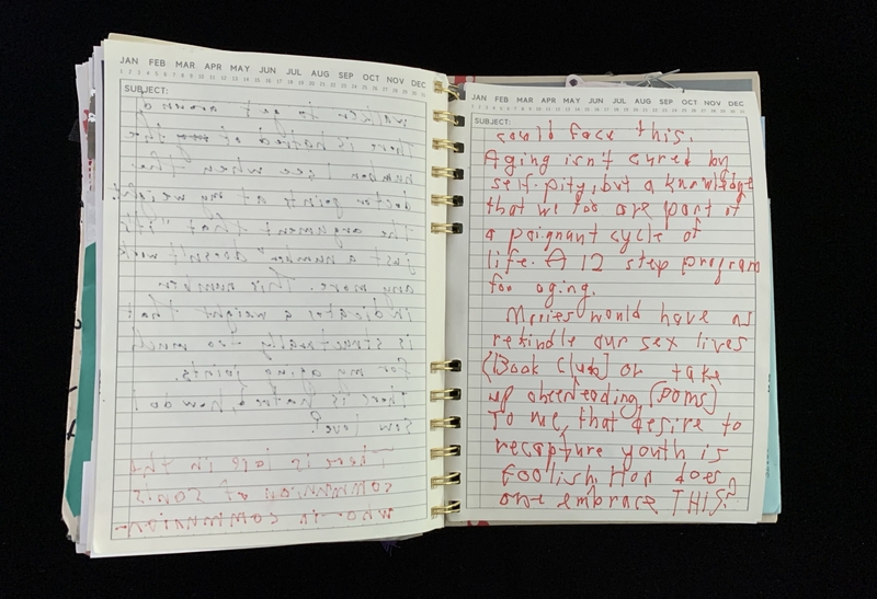 A handwritten notebook page with a mix of cursive and printed text, featuring a reflection on aging and life.