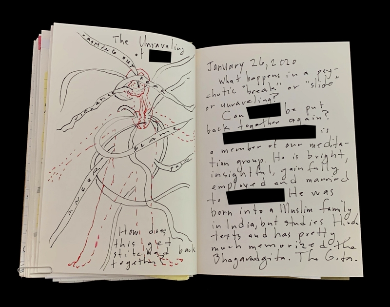 An open notebook with handwritten text and an abstract drawing, featuring redacted sections.