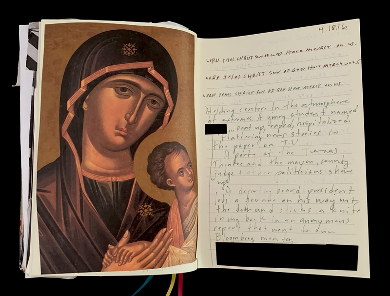 An open journal with a religious icon on the left and handwritten text on the right.