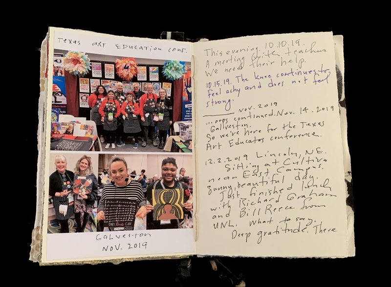 An open notebook with two pages; the left has two photographs from a conference, and the right has handwritten notes.