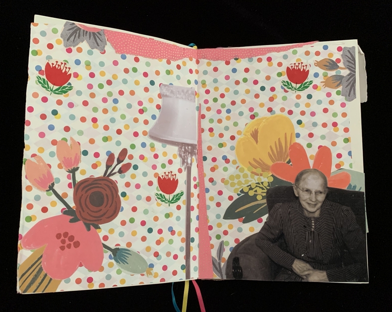 Open journal with colorful polka dot and floral designs, featuring a lamp illustration and a black-and-white cutout of a person.