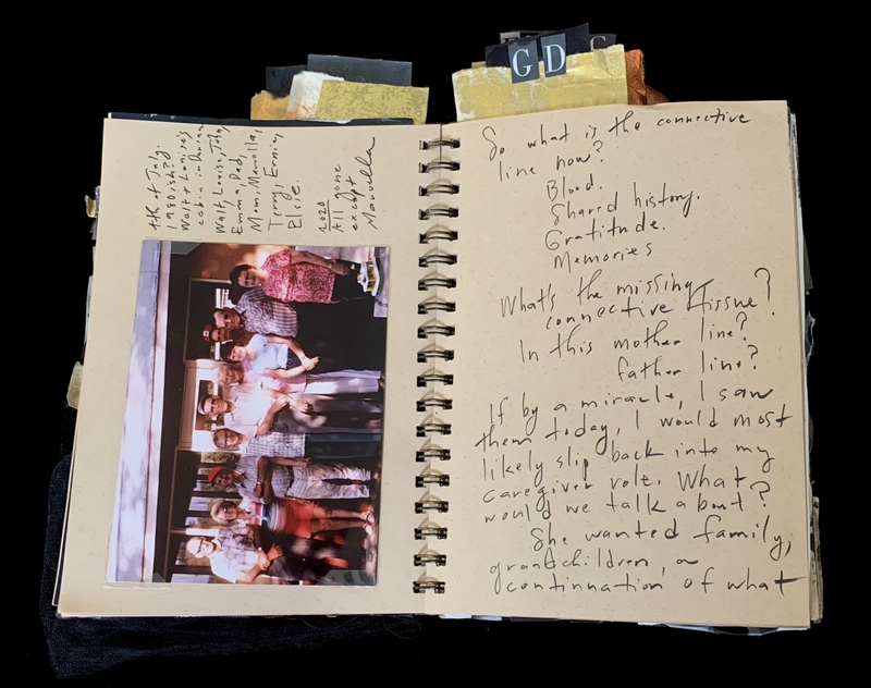 A handwritten notebook page featuring a family photograph and reflective text.