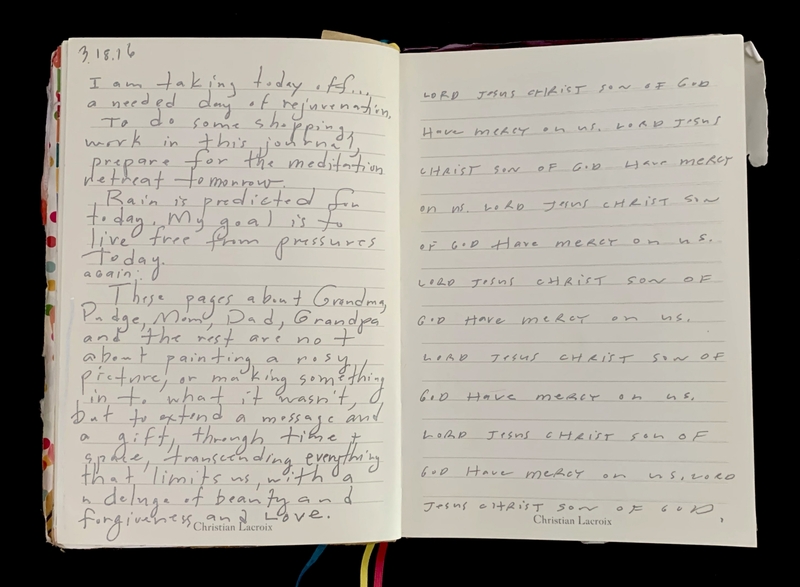 An open journal with handwritten reflections on one page and repeated religious phrases on the other.