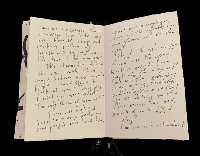 An open notebook with handwritten text on both pages, discussing marriage and relationship dynamics.