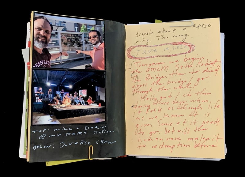 A handwritten note with a photograph of two individuals and a stage performance.