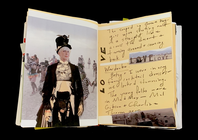 A scrapbook page featuring a photograph of a person in a costume, accompanied by handwritten notes and doodles.