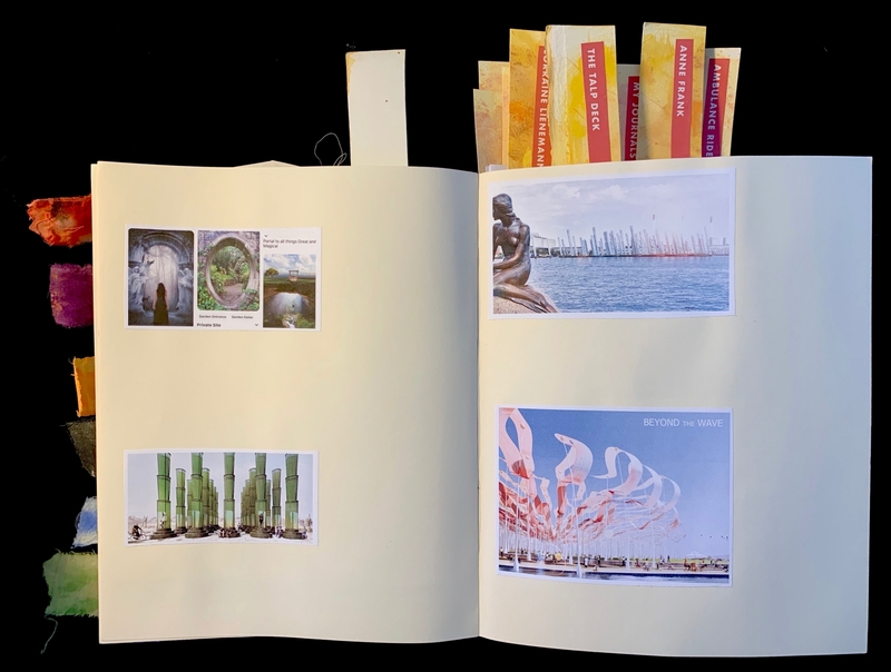 Open journal with collaged images on left and ocean statue photo on right. Colorful tabs and fabric swatches visible.