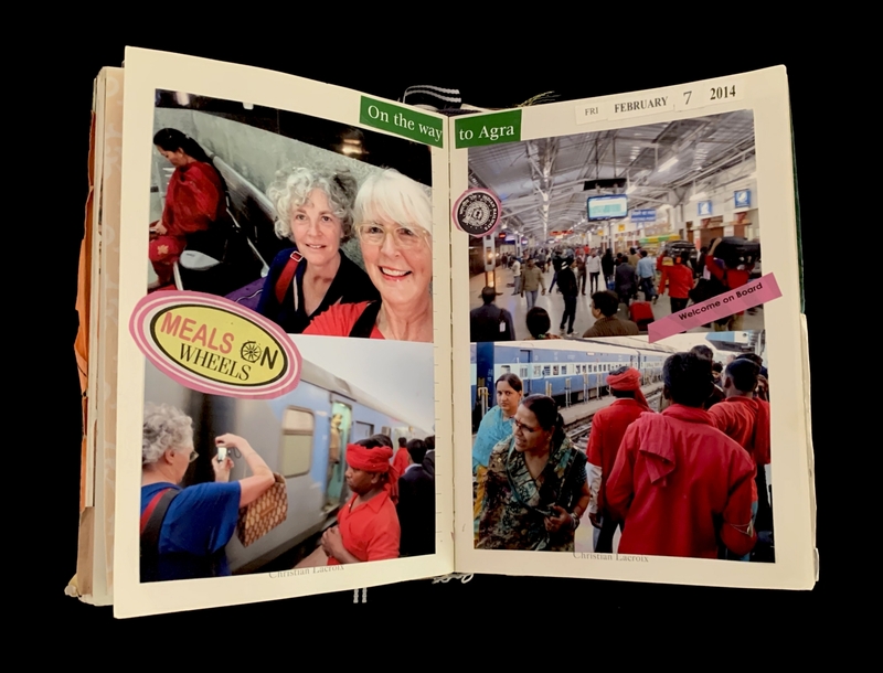A scrapbook page with travel photos at a train station, including images of people and trains, and stickers.