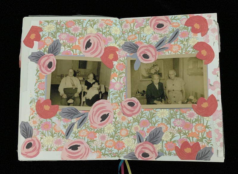 An open journal page with two sepia-toned photos set against a vibrant floral background.