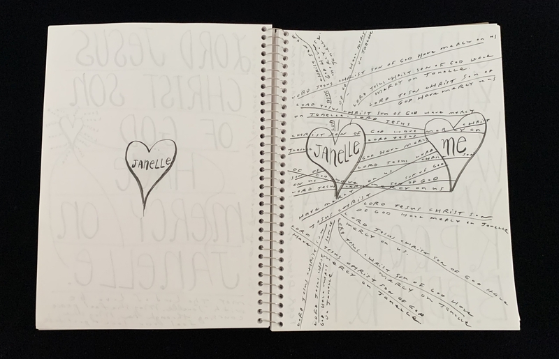 A sketchbook page featuring a heart with the name "Janelle" and another heart labeled "me," surrounded by various religious phrases.