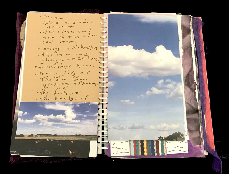 A journal page featuring handwritten notes and a photograph of a sky with clouds.