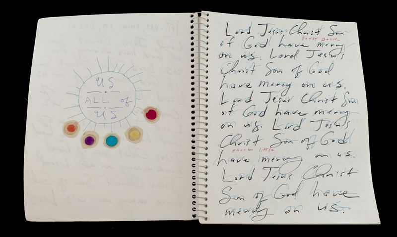 A handwritten page with a circular doodle and repeated script.