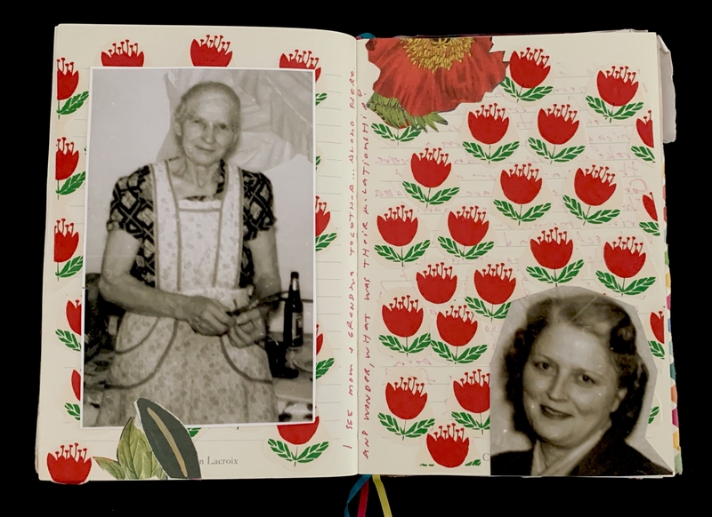 An open journal with black and white photos on pages decorated with red floral patterns and handwritten notes.