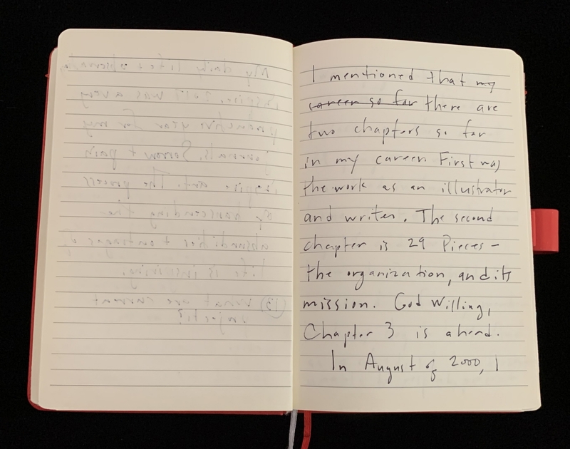 An open notebook with handwritten notes on the right page and faint, mirrored text on the left page.