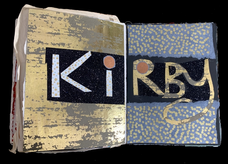 Open book with artistic "Kirby" letters on gold and dark backgrounds.