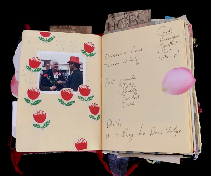 A scrapbook page featuring a photograph, decorative elements, and handwritten notes.