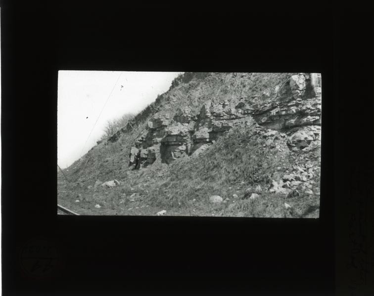 Original caption:  NAB. Film XXIV-3 4/3 1912. Shows two upper l.s. in scarp east of Cullom. Upper is 1st above Plattsmouth l.s. Lower is upper part of Plattesmouth l.s. Cass County. (121111-00233)