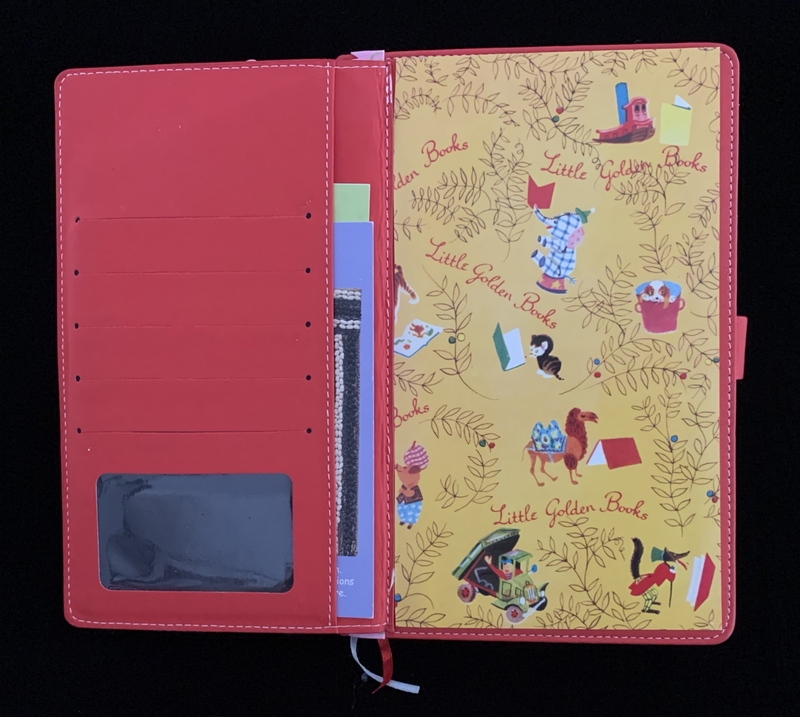 Open red folder with card slots and a "Little Golden Books" themed insert with illustrations.