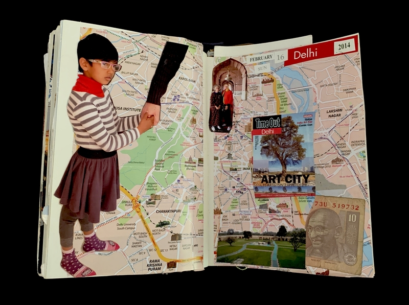Open scrapbook with a map of Delhi and collage of images including a child, magazine cover, and currency.