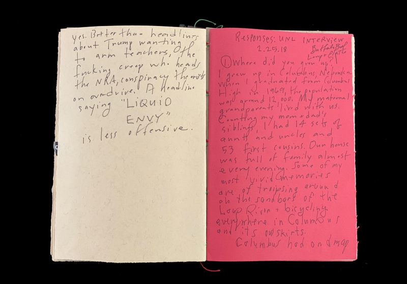Two pages of a handwritten document; left page on yellow paper, right page on pink paper, with personal and interview content.