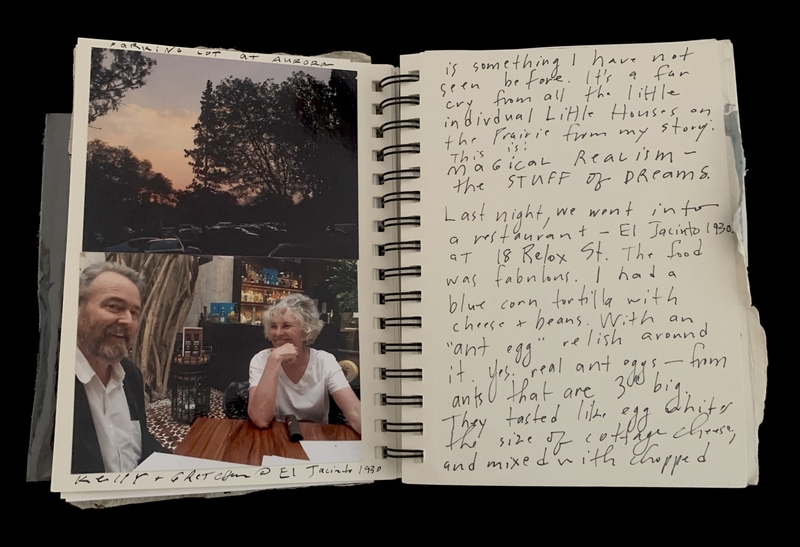 A handwritten journal page featuring a photograph of two individuals and a description of a meal at a restaurant.