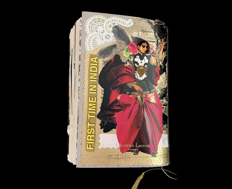 A book cover featuring a vibrant illustration of a woman in traditional Indian attire, with the title "First Time in India" by Christian Lacroix Papier.