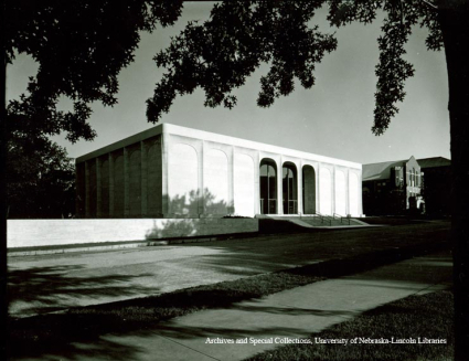 Fred Wells, President, Nebraska Art Association, Clarence Swanson, Board of Regents, and Mrs A. Bromley Sheldon (Olga) inspect the travertine marble during construction of the gallery.