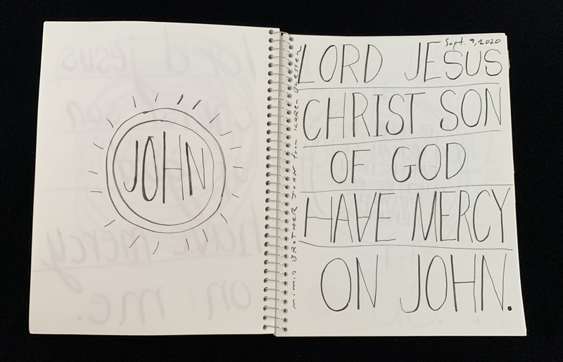 A handwritten prayer page featuring a circular doodle and a prayer text.