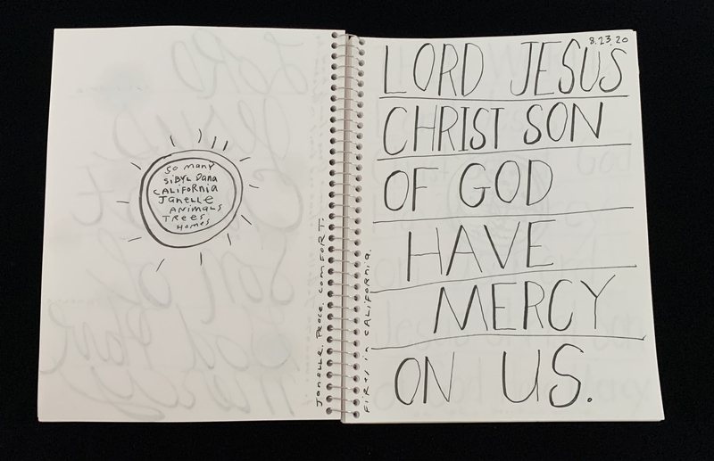 A handwritten prayer page with a circular doodle and text referencing Jesus Christ.