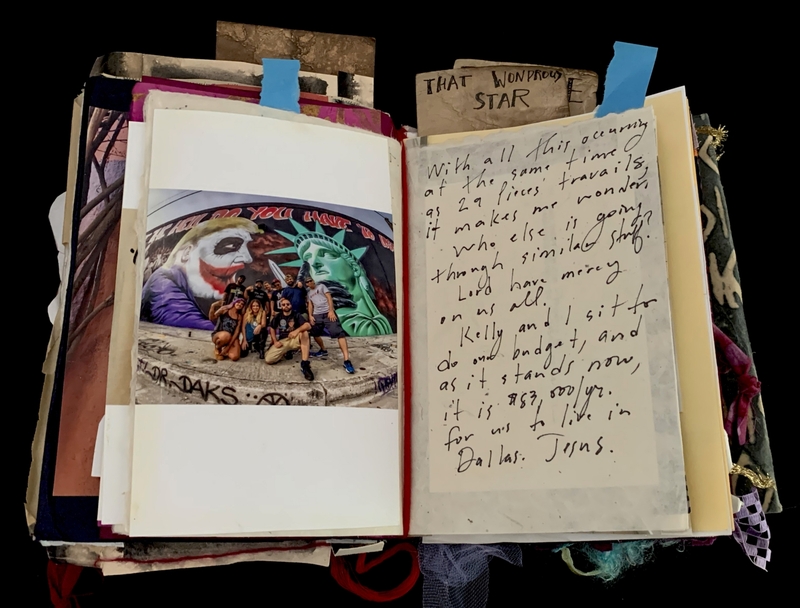 A scrapbook page featuring a photograph of a group of people in front of a mural and handwritten notes.