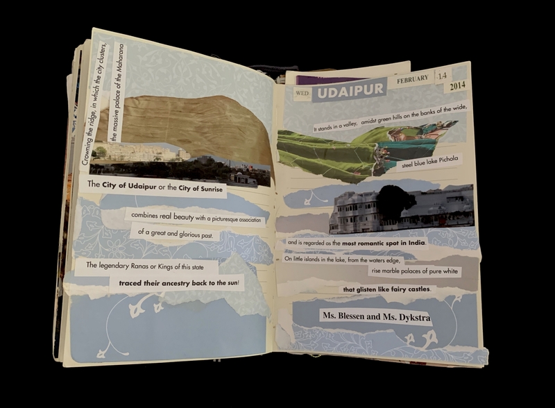 Open scrapbook pages describing Udaipur with images and text snippets, featuring palaces and landscapes.