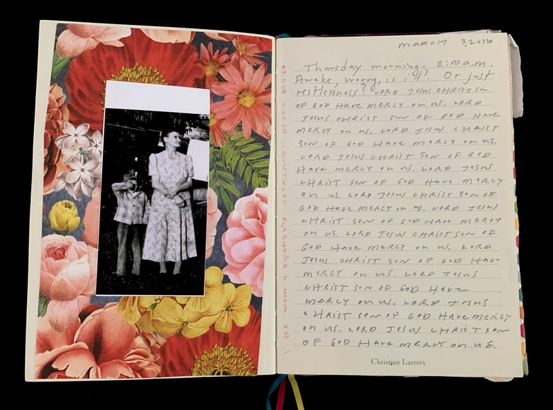 Open journal with a colorful floral page and a black and white photo on the left, and handwritten text on the right.