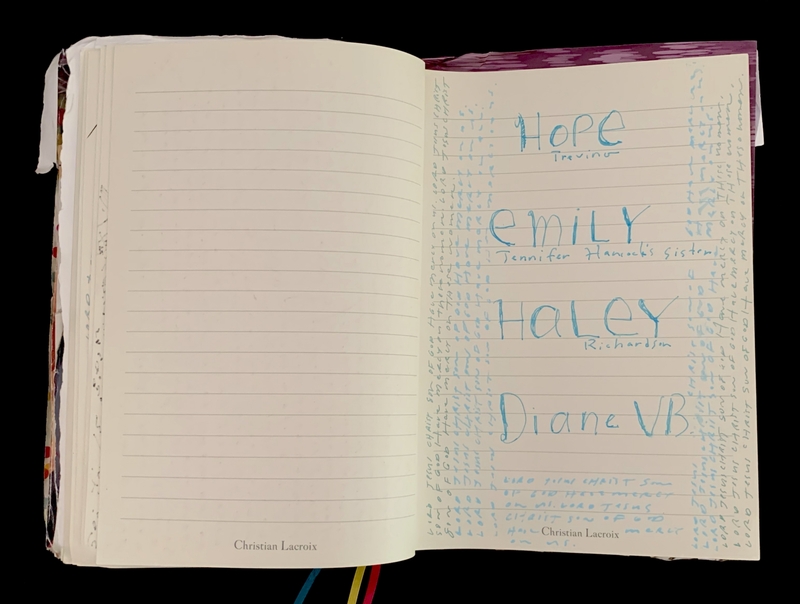 Open journal with handwritten names.