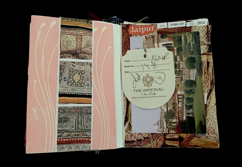 Open scrapbook with pink and patterned pages and a hotel tag from "The Imperial, New Delhi."