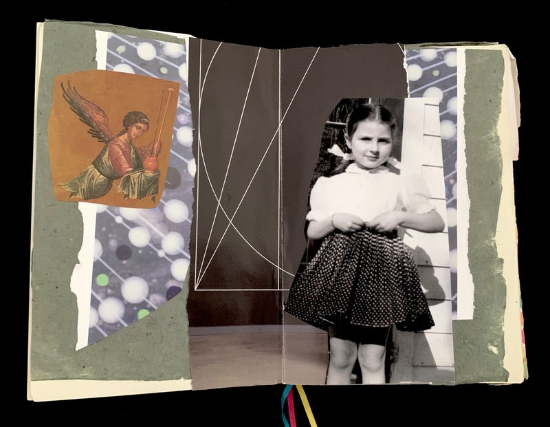 An open journal showing an illustration of an angel and a vintage photo of a young girl.