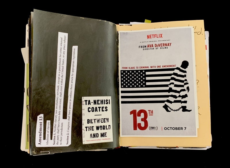 A collection of documents and promotional materials, including a Netflix poster and a book cover, is displayed in an open book.