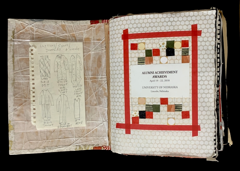 An open book showing garment sketches on the left page and an event design with text on the right page.