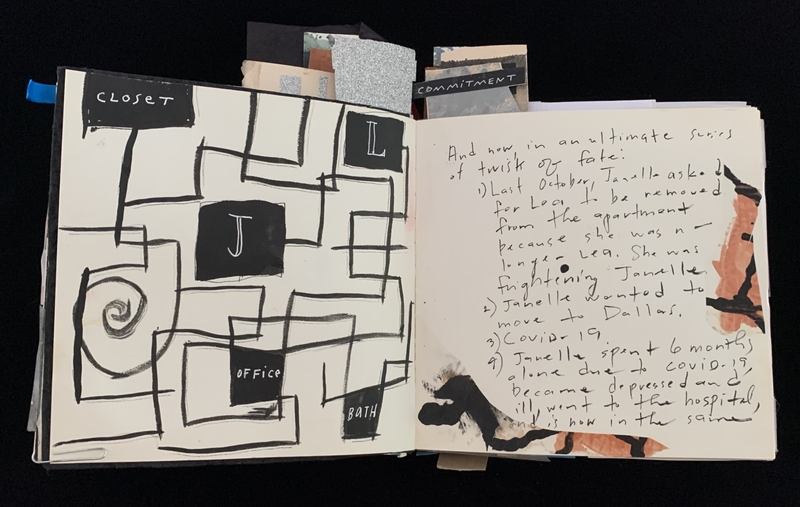 Open journal with abstract patterns and handwritten text.