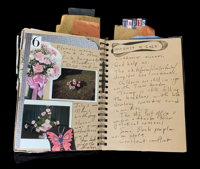 A scrapbook page featuring a photograph of flowers, a butterfly illustration, and handwritten notes reflecting current events and personal reflections.