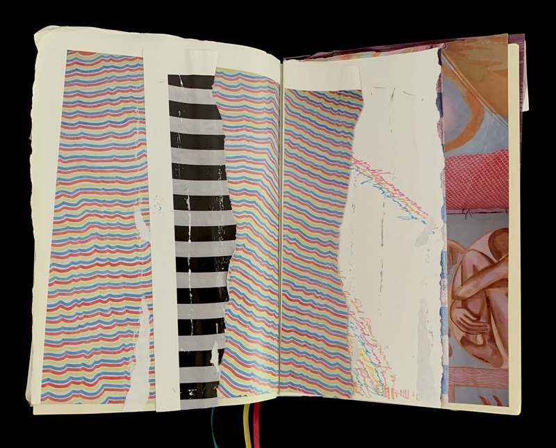 Open journal with colorful wavy patterns, black and white stripes, and handwritten text.