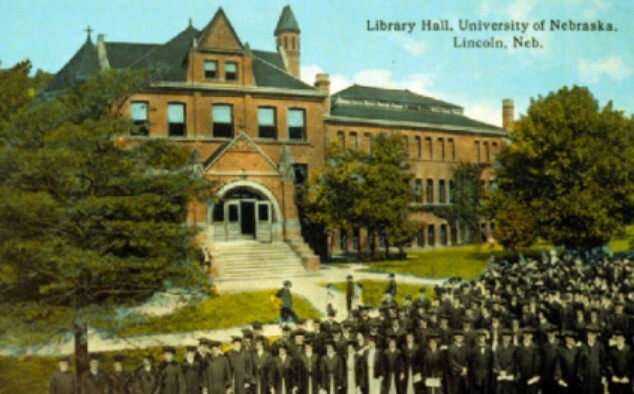 Postcard view of Library with graduates.