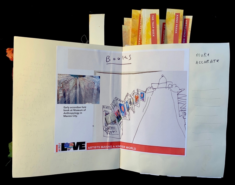 Open journal with a printed photo, handwritten text, an illustration, and labeled tabs.