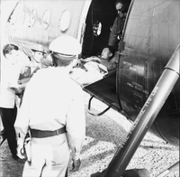 "Ca Mau" Vietnamese man is loaded onto a helicopter.