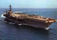 USS Kitty Hawk aircraft carrier on the open sea.
