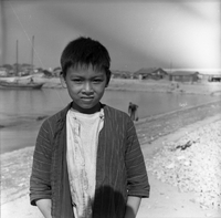 "Macau" One boy poses for a photo.