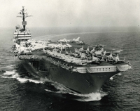USS Kitty Hawk aircraft carrier on the open sea.