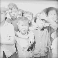 "Cao Lanh - M:VED Operation - etc." A bright shot of a group of Vietnamese children.