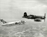 A Corsair II in flight with a second aircraft.