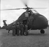 "Cao Lanh - M:VED Operation - etc." Several soldiers stand near the enterance of a helicopter.