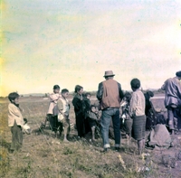 "Montagnard - An Lac Airlift - Jan '63" - Group of Montagnard people in field.